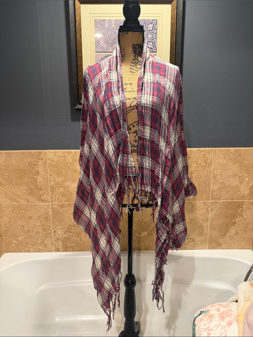 Plaid Fringe Wrap with sleeves.